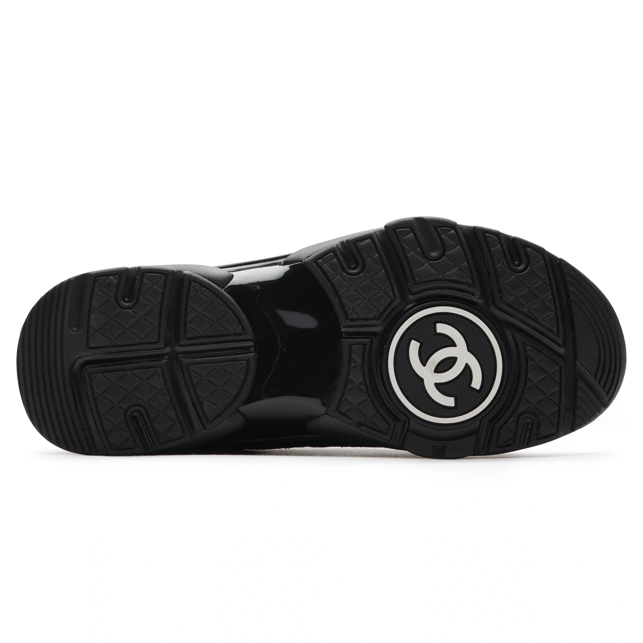 Sole view of Chanel CC Logo Suede Triple Black Sneaker